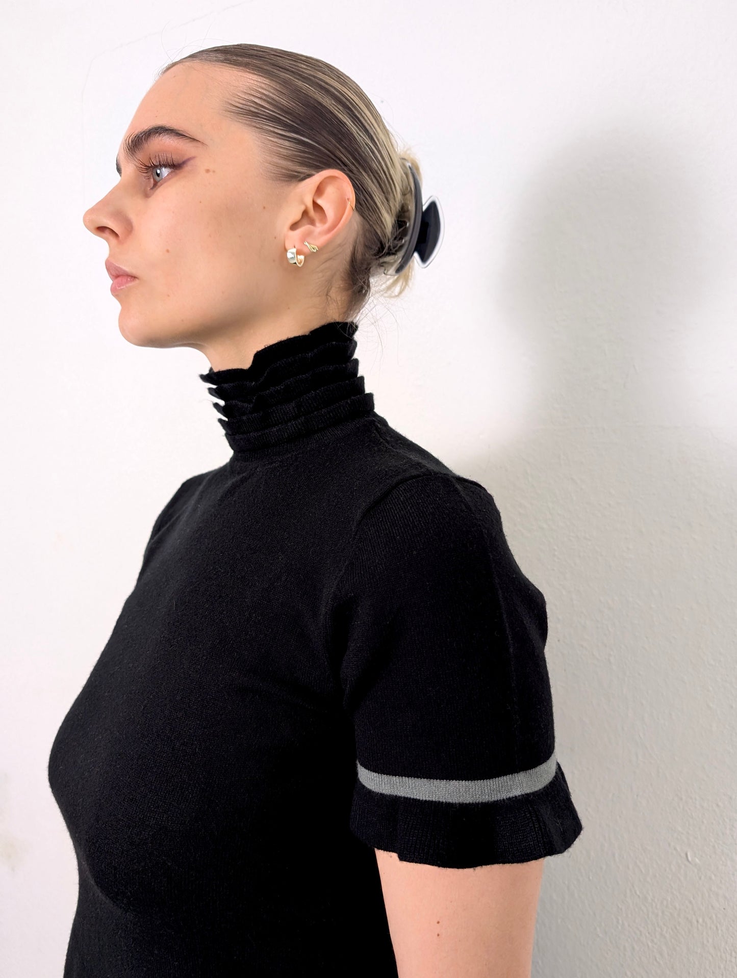 RUFFLED TURTLENECK
