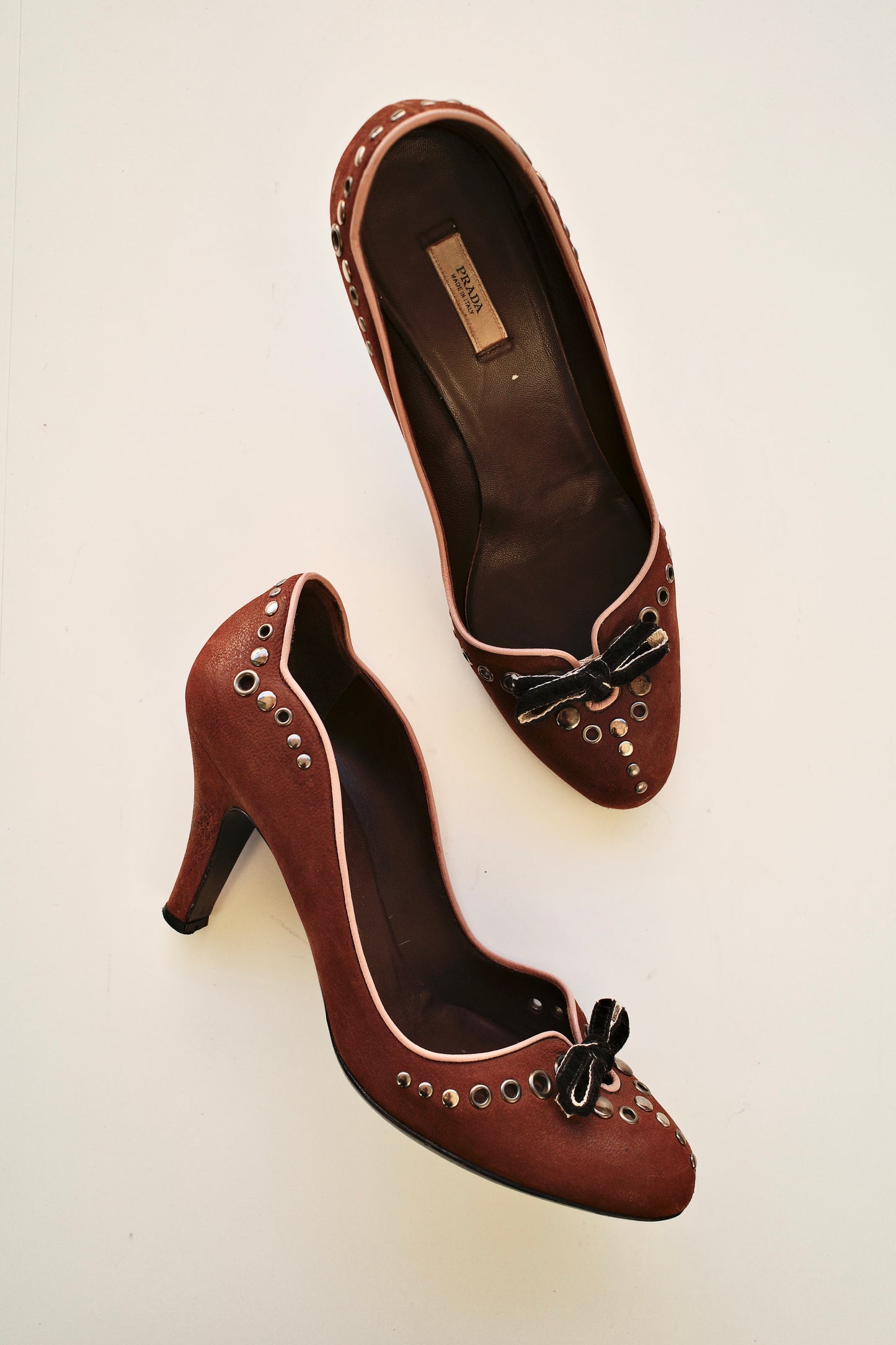 PRADA STUDDED LEATHER PUMPS