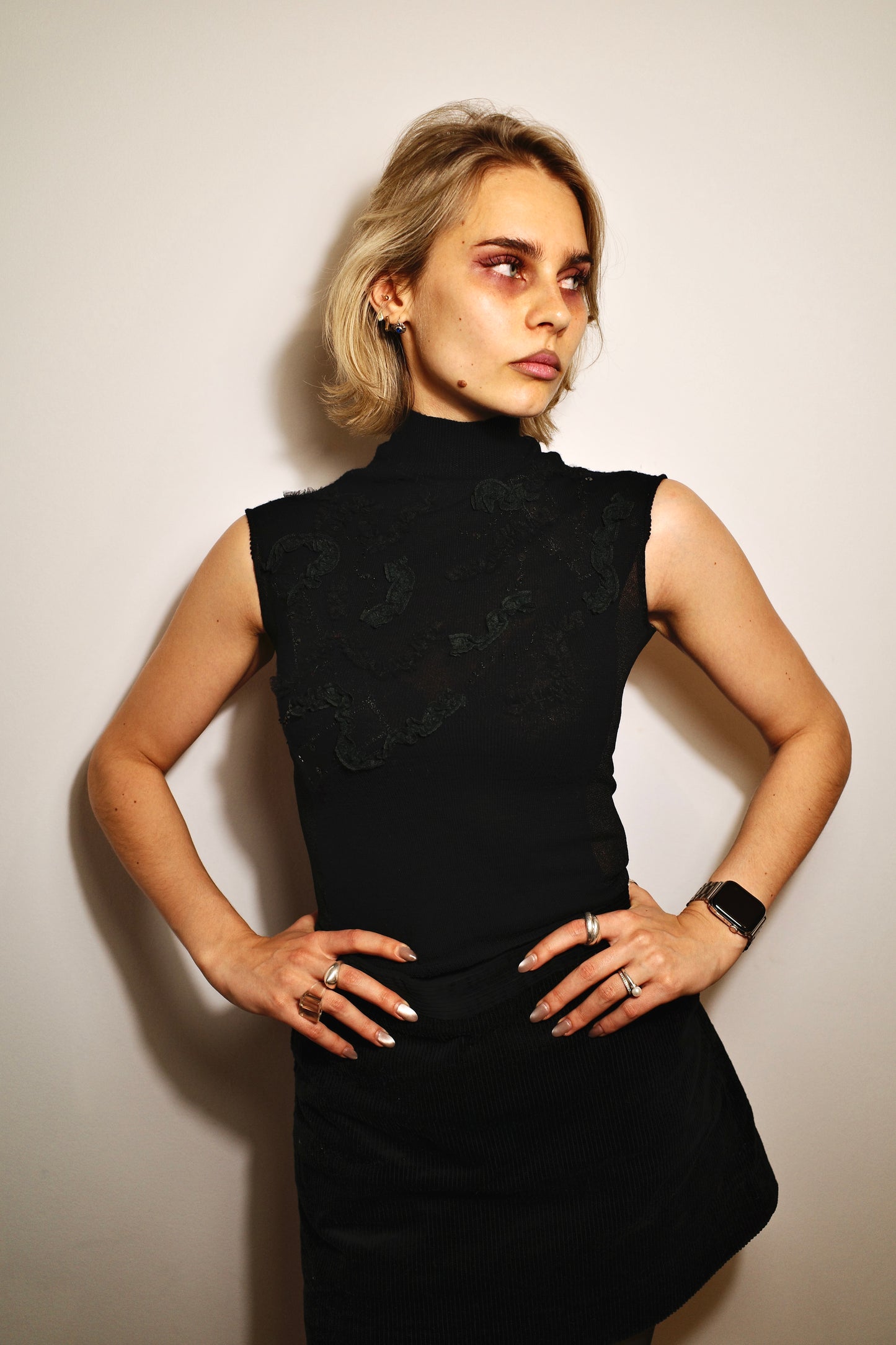 SLEEVELESS BEADED TURTLENECK