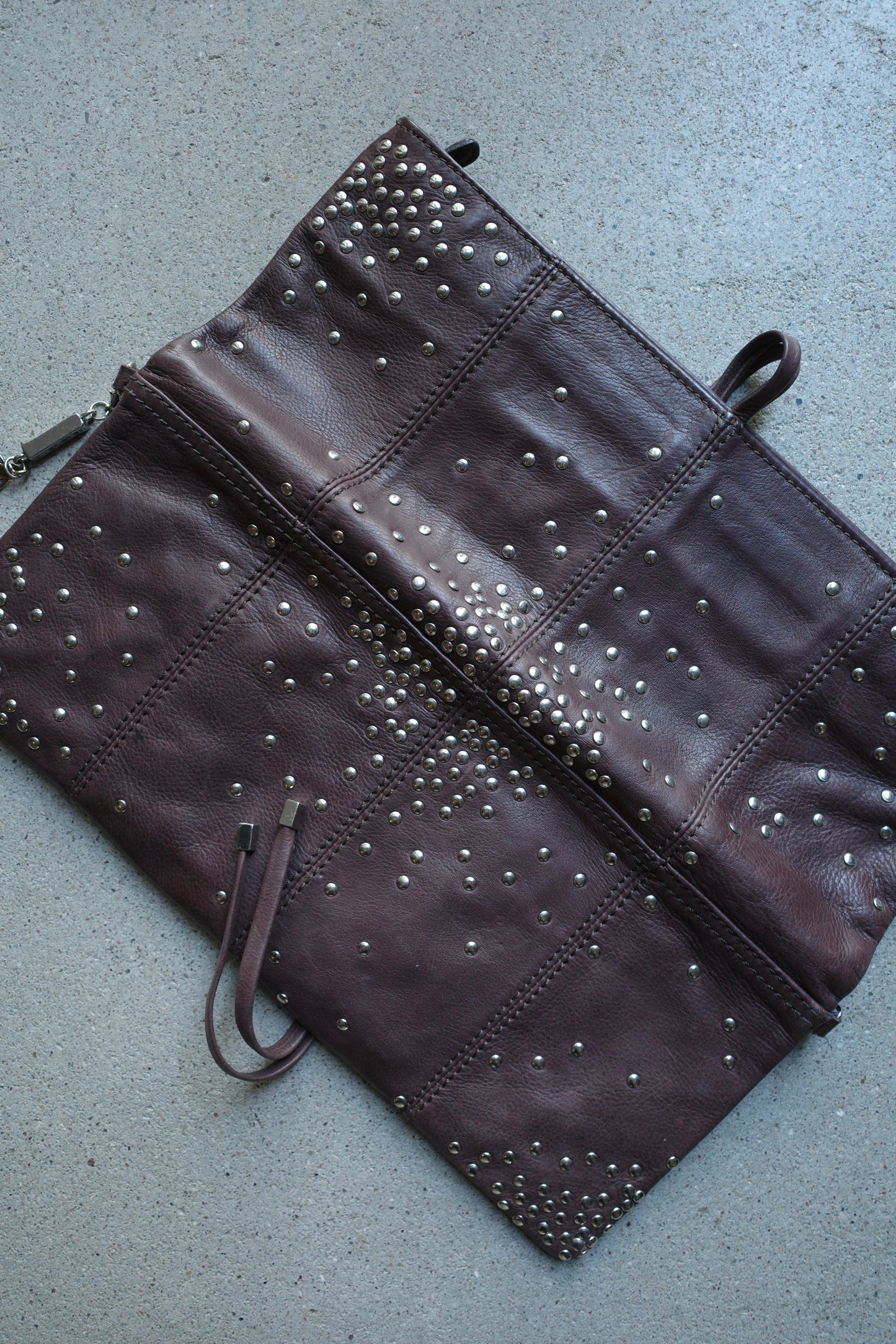 STUDDED MULTICOLOR LEATHER CLUTCH