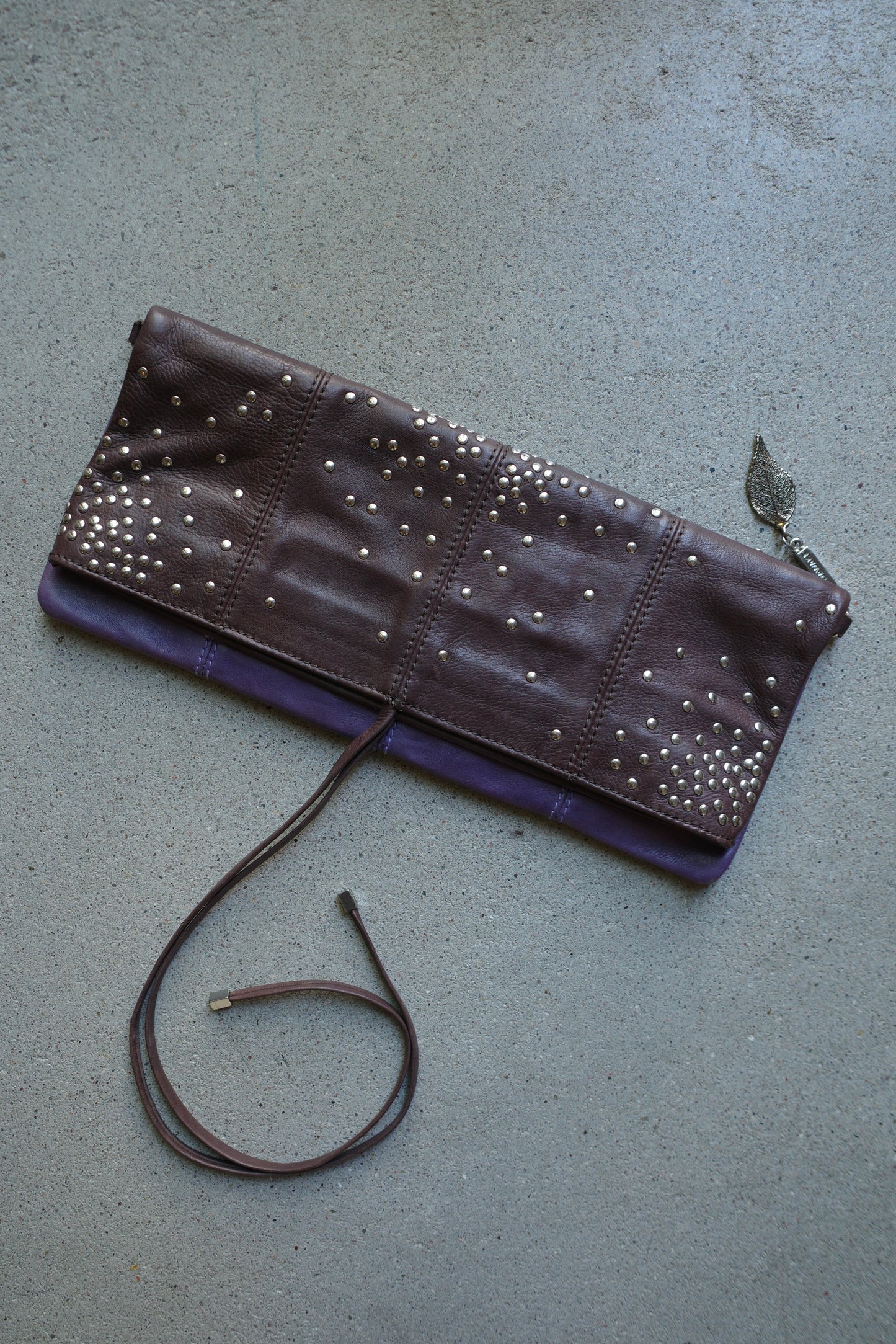 STUDDED MULTICOLOR LEATHER CLUTCH