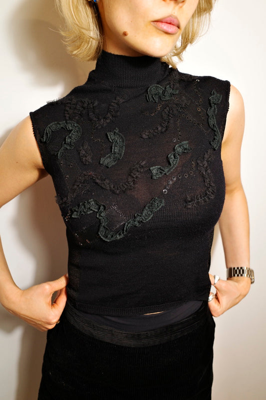 SLEEVELESS BEADED TURTLENECK