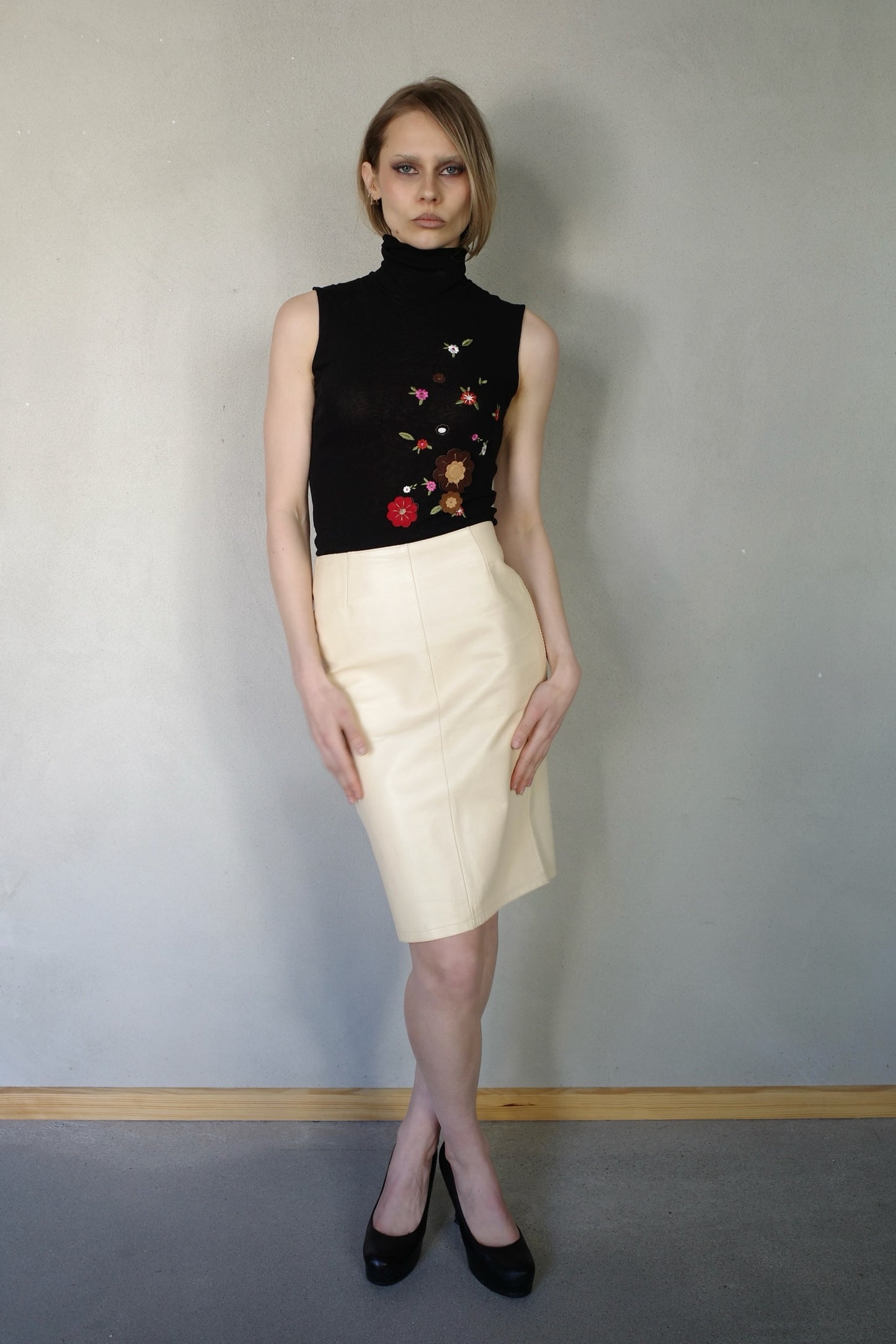 LEATHER MIDI SKIRT